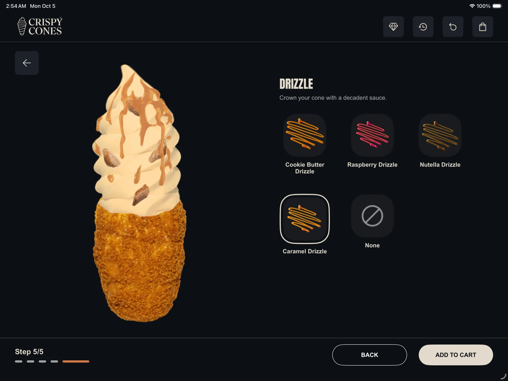 Step 5 of the cone builder: the finished cone with toppings and a caramel drizzle.